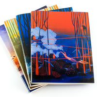 Quaderno notebooks stack by June Digan with Boundless Journey on top