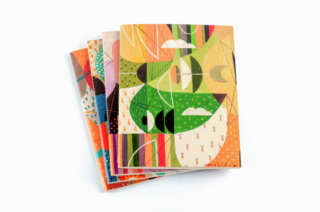 Quaderno notebooks stack by Jomike Tejido with Urban Farming notebook on top