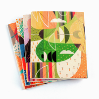 Quaderno notebooks stack by Jomike Tejido with Urban Farming notebook on top